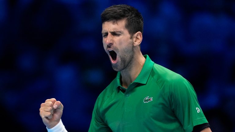 Serbia's Novak Djokovic reacts after scoring a point against Norway's Casper Ruud during their singles final tennis match of the ATP World Tour Finals at the Pala Alpitour, in Turin, Italy, Sunday, Nov. 20, 2022. (AP Photo/Antonio Calanni)