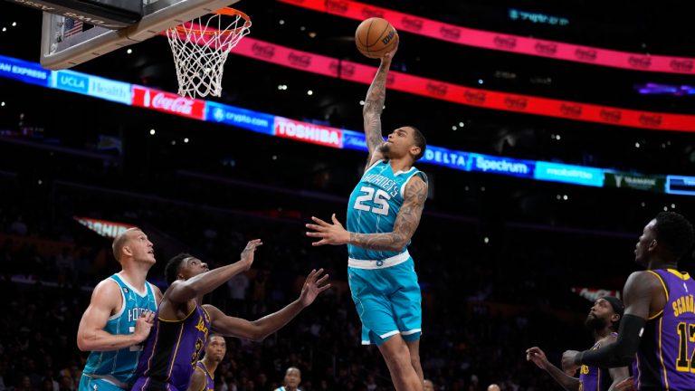 Charlotte Hornets forward P.J. Washington (25) goes up for a dunk against the Los Angeles Lakers during the second half of an NBA basketball game Friday, Dec. 23, 2022, in Los Angeles. (Marcio Jose Sanchez/AP)