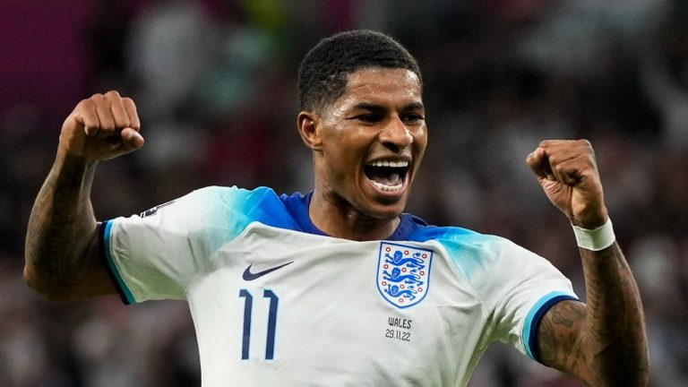 England's Marcus Rashford celebrates after scoring his side's third goal during the World Cup group B soccer match between England and Wales, at the Ahmad Bin Ali Stadium in Al Rayyan , Qatar, Tuesday, Nov. 29, 2022. (Frank Augstein/AP Photo)
