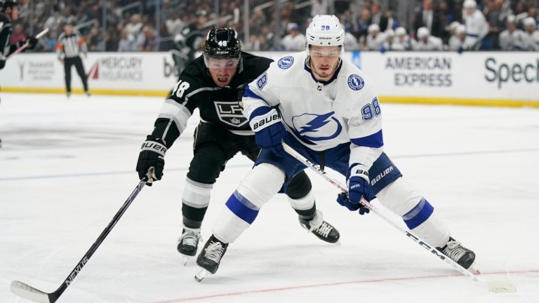 Los Angeles Kings left wing Brendan Lemieux (48) defends against Tampa Bay Lightning defenseman Mikhail Sergachev (98) during the second period of an NHL hockey game Tuesday, Oct. 25, 2022, in Los Angeles. (Ashley Landis/AP)