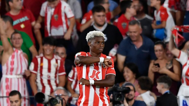 Almeria's Largie Ramazani celebrates in front of home fans after scoring the opening goal during a Spanish La Liga soccer match between Almeria and Real Madrid at the Power Horse stadium in Almeria, Spain, Sunday, Aug. 14, 2022. (Jose Breton/AP)