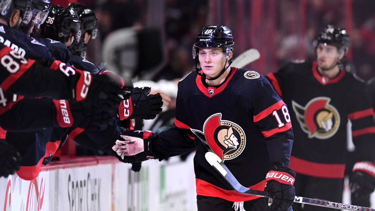 Ottawa Senators left wing Tim Stutzle (18) celebrates his hat trick goal against the Seattle Kraken with teammates during third period NHL hockey action in Ottawa, on Saturday, Jan. 7, 2023. (CP)