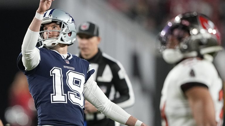 Dallas Cowboys place kicker Brett Maher (19) watches his extra point miss against the Tampa Bay Buccaneers during the second half of an NFL wild-card football game, Monday, Jan. 16, 2023, in Tampa, Fla. (AP Photo/Chris Carlson)