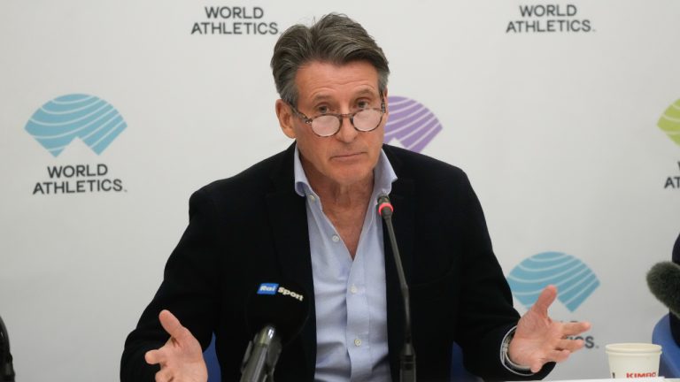 World Athletics President Sebastian Coe holds a press conference at the conclusion of the World Athletics meeting at the Italian National Olympic Committee, headquarters, in Rome, Nov. 30, 2022. Track and field's governing body is facing renewed criticism for a proposal to allow transgender athletes to continue competing in top female events, although with stricter rules. (AP Photo/Gregorio Borgia)