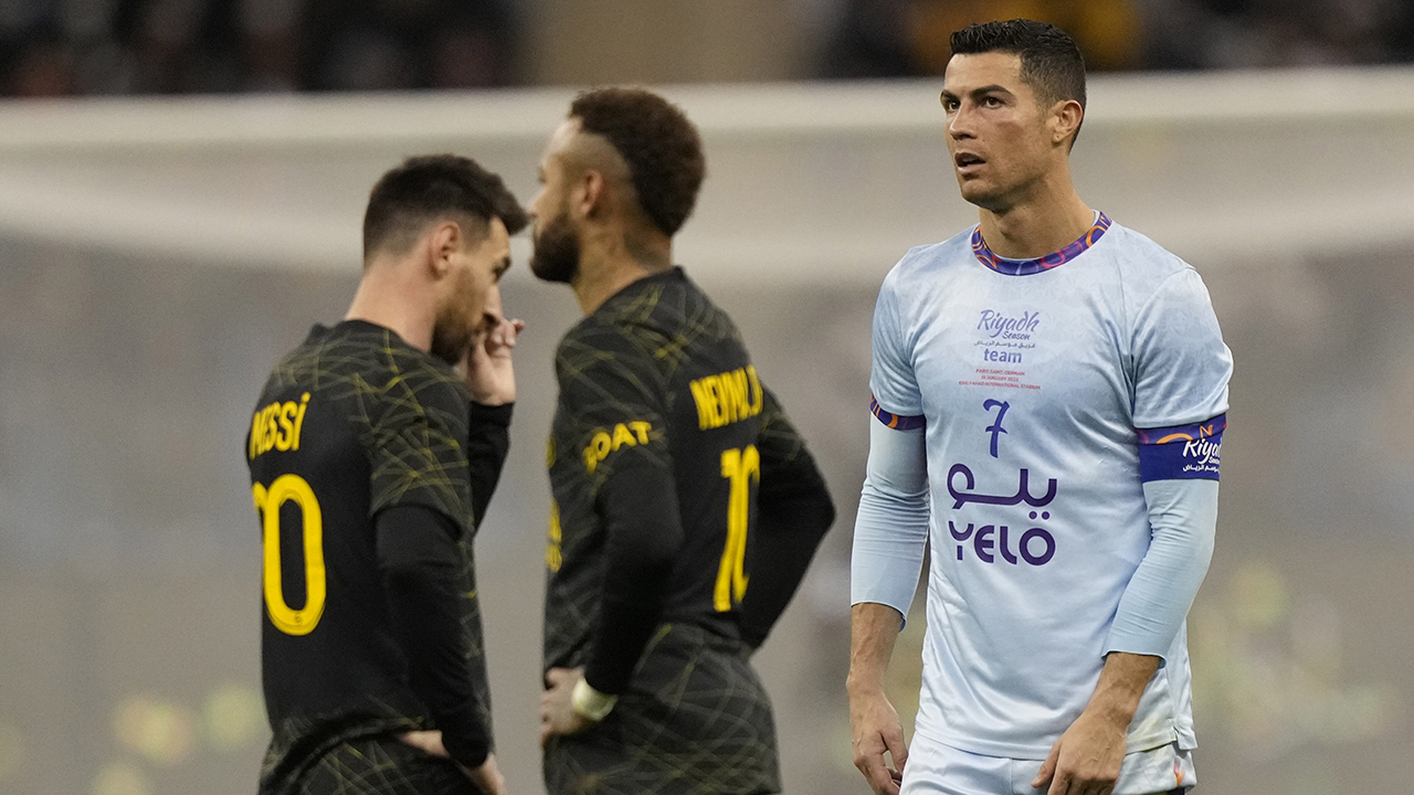 Bruised Ronaldo scores twice to edge showdown with Messi