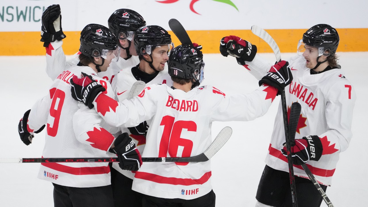 Bedard sets 5 records, posts OT winner to lead Canada to world
