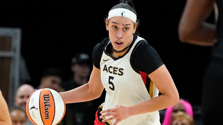 Las Vegas Aces' Dearica Hamby (5) dribbles up court during a WNBA basketball game against the Phoenix Mercury, on May 6, 2022, in Phoenix. (Darryl Webb/AP)