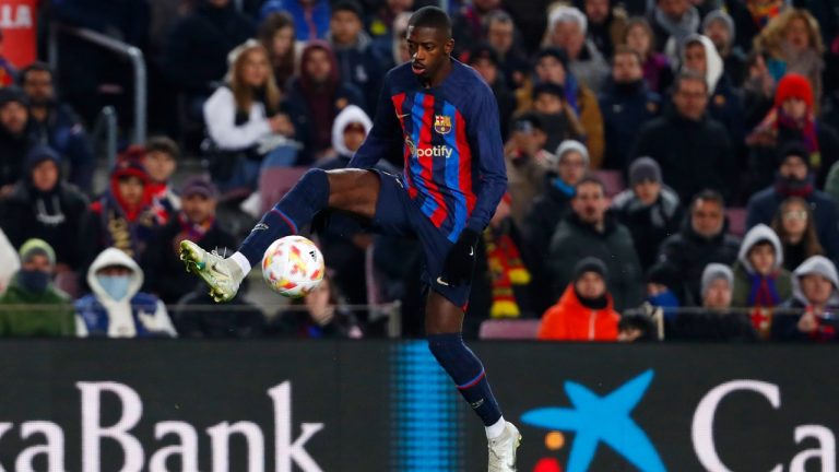 Barcelona's Ousmane Dembele controls the ball to score his side's opening goal during the Spanish Copa del Rey soccer match between Barcelona and Real Sociedad at the Camp Nou stadium. (Joan Monfort/AP)