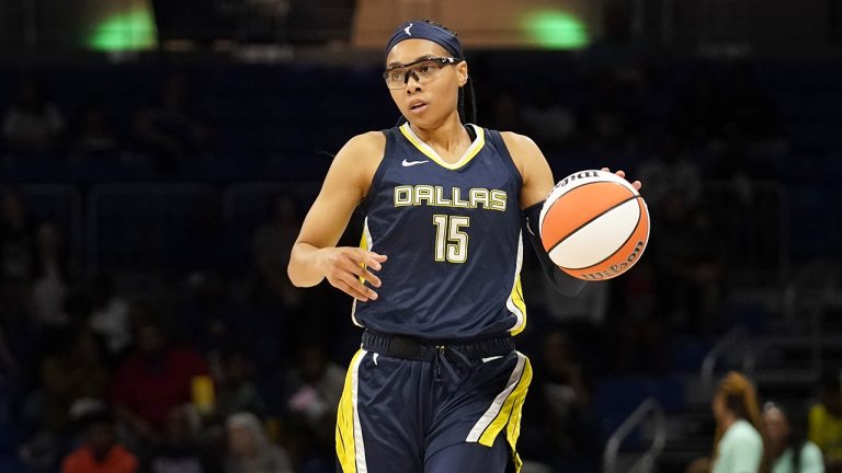 Dallas Wings guard Allisha Gray handles the ball during a WNBA basketball game against the New York Liberty in Arlington, Texas, on Aug. 10, 2022. In a deal announced Saturday, Jan. 21, 2023, the Atlanta Dream have acquired Olympic gold-medalist Gray in a trade that sent a pair of first-round picks to the Dallas Wings. (Tony Gutierrez/AP)