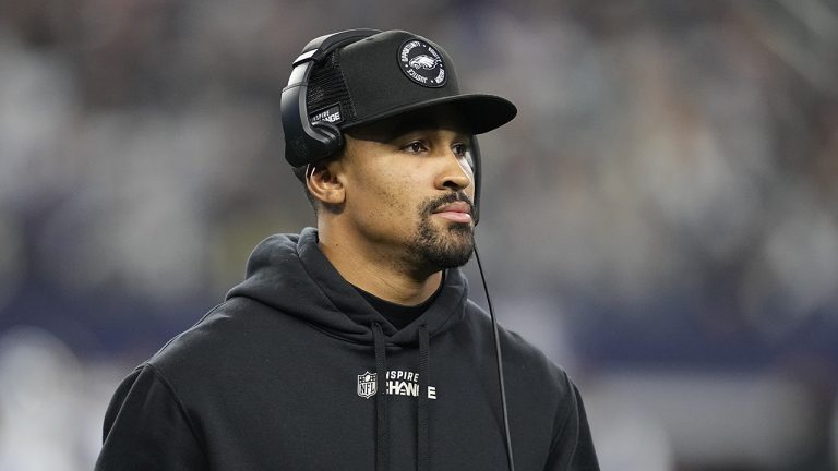 Philadelphia Eagles' Jalen Hurts is seen on the sideline during the second half of an NFL football game against the Dallas Cowboys Saturday, Dec. 24, 2022, in Arlington, Texas. (Tony Gutierrez/AP)