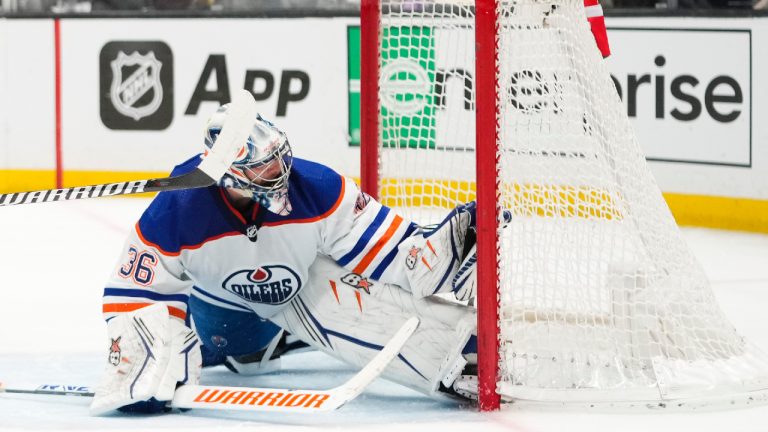 Edmonton Oilers goaltender Jack Campbell (36) catches the puck hit by Los Angeles Kings' Adrian Kempe during the second period of an NHL hockey game Monday, Jan. 9, 2023, in Los Angeles. The play was ruled a goal after a video review. (Jae C. Hong/AP)