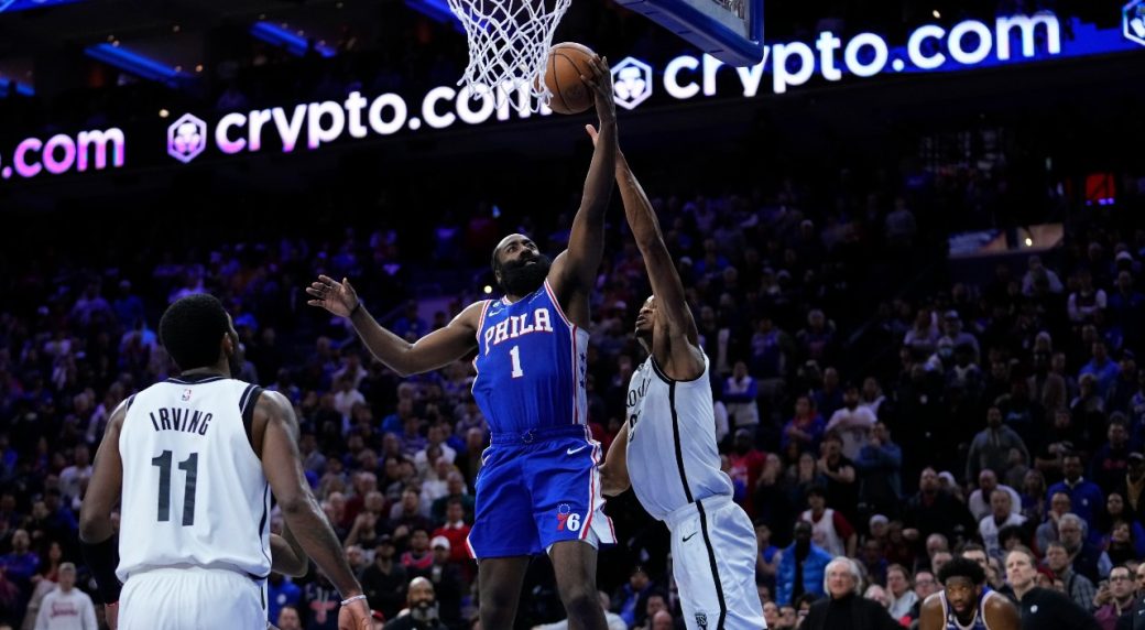 NBA Roundup: Harden hits pair of late threes, 76ers outscore Nets