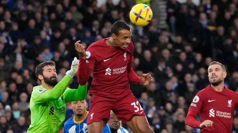 Liverpool's Joel Matip heads the ball during the English Premier League soccer match between Brighton and Liverpool at the Falmer Stadium in Brighton, England, Saturday, Jan. 14, 2023. (Frank Augstein/AP)