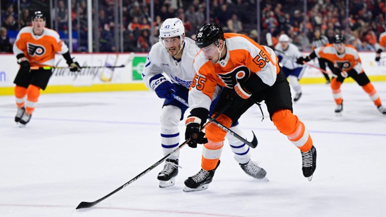 Philadelphia Flyers' Rasmus Ristolainen, right, and Toronto Maple Leafs' Pierre Engvall race for the puck during the first period of an NHL hockey game, Sunday, Jan. 8, 2023, in Philadelphia. (Derik Hamilton/AP)