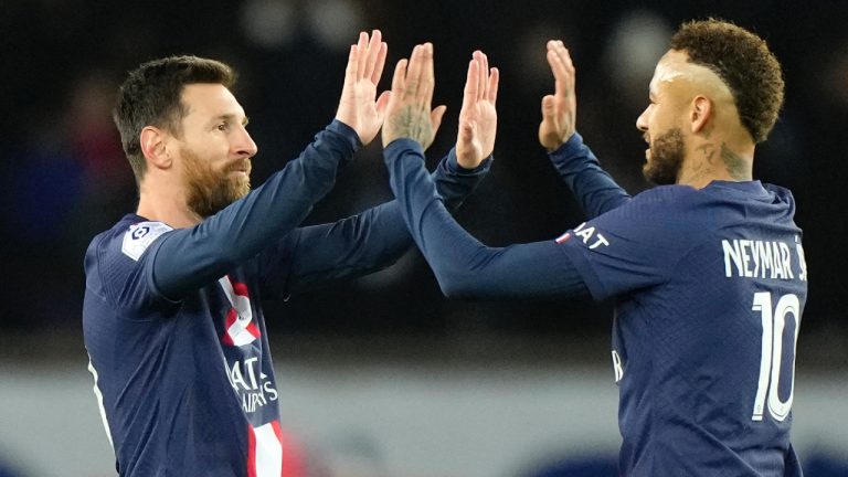PSG's Lionel Messi, left, celebrates with PSG's Neymar after scoring his sides second goal during the French League One soccer match between Paris Saint-Germain and Angers at the Parc des Princes in Paris, France, Wednesday, Jan. 11, 2023. (Francois Mori/AP)