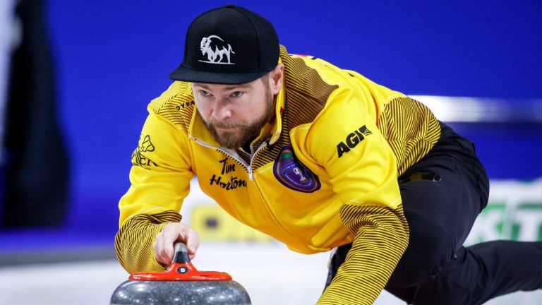 Team Manitoba skip Mike McEwen makes a shot while playing Team Nunavut at the Tim Hortons Brier in Lethbridge, Alta., Wednesday, March 9, 2022. (Jeff McIntosh/CP)