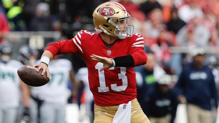 San Francisco 49ers quarterback Brock Purdy (13) passes against the Seattle Seahawks during the first half of an NFL wild card playoff football game in Santa Clara, Calif., Saturday, Jan. 14, 2023. (Josie Lepe/AP)