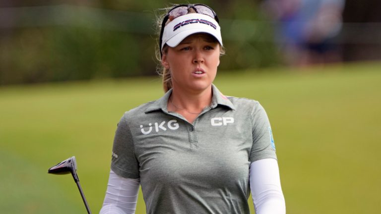 Brooke Henderson watches her shot to the green from the ninth fairway during the final round of the LPGA Hilton Grand Vacations Tournament of Champions, Sunday, Jan. 22, 2023, in Orlando, Fla. (John Raoux/AP) 
