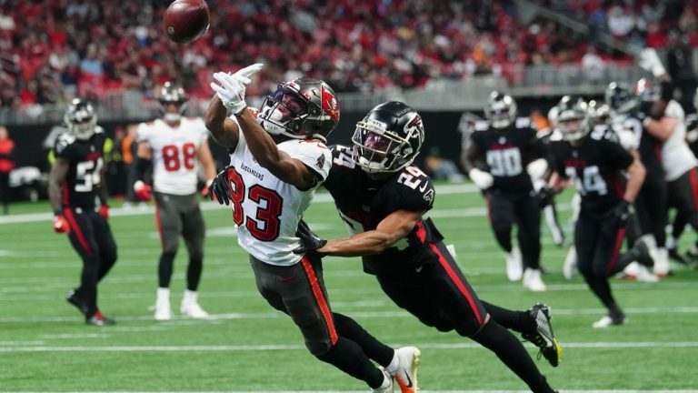 Tampa Bay Buccaneers wide receiver Deven Thompkins (83) misses the catch against Atlanta Falcons cornerback A.J. Terrell (24) during the first half of an NFL football game, Sunday, Jan. 8, 2023, in Atlanta. (John Bazemore/AP) 