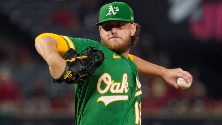 Oakland Athletics starting pitcher Cole Irvin throws to the plate during the first inning of a baseball game against the Los Angeles Angels. (Mark J. Terrill, File/AP)