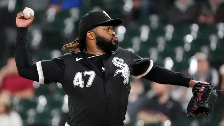 Chicago White Sox starting pitcher Johnny Cueto throws to a Cleveland Guardians batter during the first inning of a baseball game. (David Banks/AP)