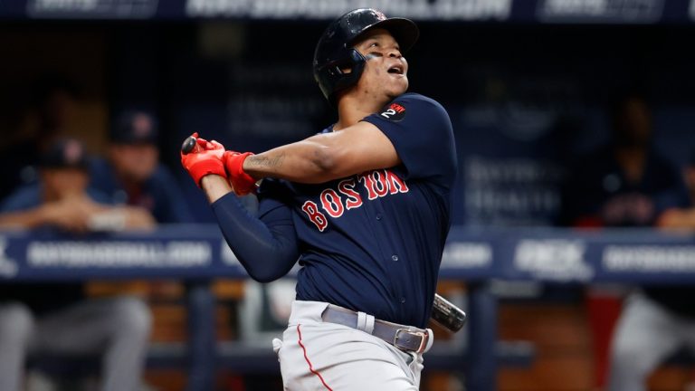 Boston Red Sox's Rafael Devers watches his RBI-single against the Tampa Bay Rays during the third inning of a baseball game Monday, Sept. 5, 2022, in St. Petersburg, Fla. (Scott Audette/AP)