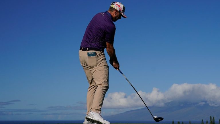 Mackenzie Hughes plays his shot from the first tee during the first round of the Tournament of Champions golf event, Thursday, Jan. 5, 2023, at Kapalua Plantation Course in Kapalua, Hawaii. (Matt York/AP Photo)