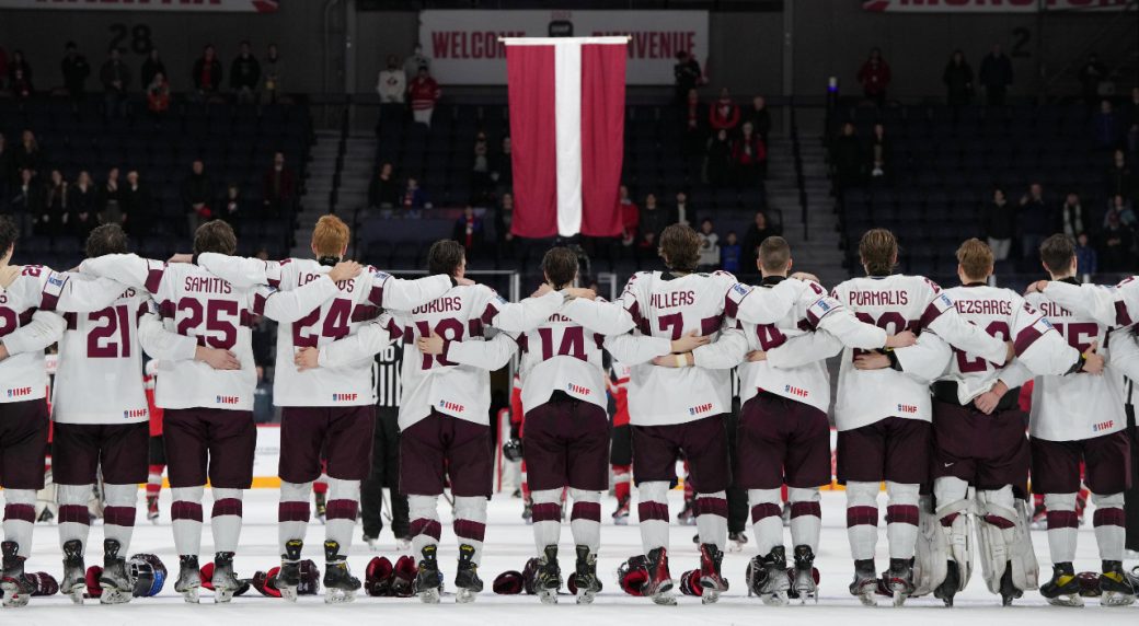 Latvia sweeps world junior relegation series with win over Austria