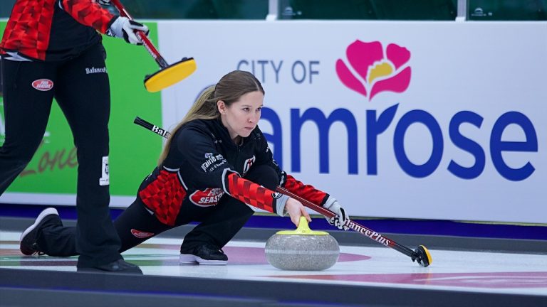 Kaitlyn Lawes shoots a stone during the first draw of the Co-op Canadian Open on Tuesday, Jan. 10, 2023, in Camrose, Alta. (Anil Mungal/GSOC)