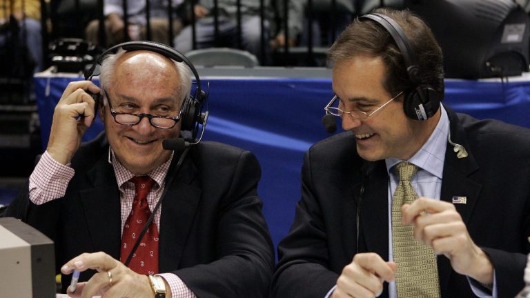 In this March 12, 2006, file photo, CBS announcers Billy Packer, left, and Jim Nantz laugh during a break in the action in the championship basketball game in the Big Ten Conference tournament in Indianapolis. (Michael Conroy/AP)