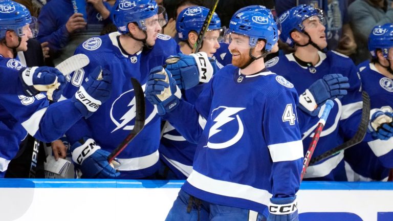 Tampa Bay Lightning defenceman Nick Perbix (48) celebrates his goal against the Buffalo Sabres with teammates during the third period of an NHL hockey game Saturday, Nov. 5, 2022, in Tampa, Fla. (Chris O'Meara/AP)