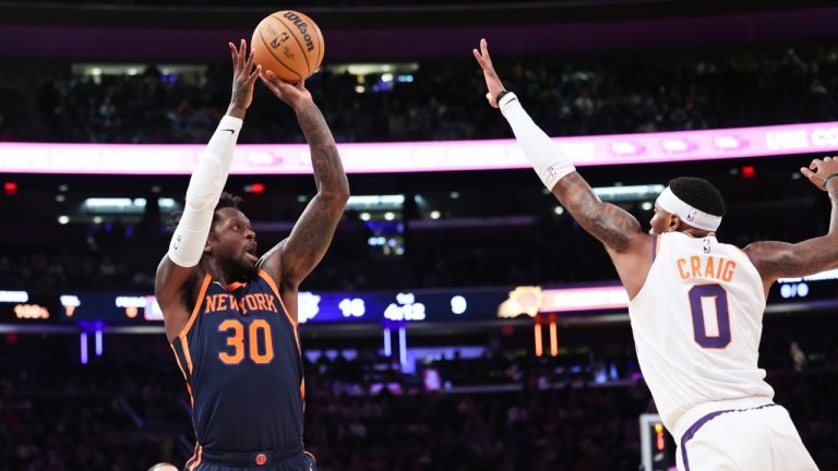 New York Knicks forward Julius Randle (30) shoots against Phoenix Suns forward Torrey Craig (0) during the first half of an NBA basketball game, Monday, Jan. 2, 2023, in New York. (Jessie Alcheh/AP)