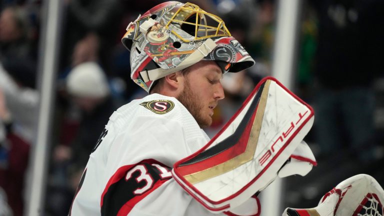 Ottawa Senators goaltender Anton Forsberg reacts after giving up a goal to Colorado Avalanche center Alex Newhook in the first period of an NHL hockey game Saturday, Jan. 14, 2023, in Denver. (David Zalubowski/AP) 