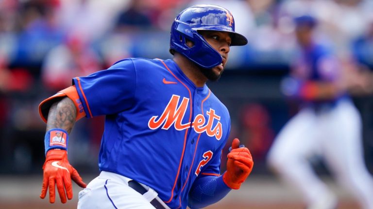 New York Mets' Dominic Smith runs to second base for an RBI double as Jeff McNeil scores during the third inning in the first baseball game of a doubleheader Tuesday, May 17, 2022, in New York. (Frank Franklin II/AP)