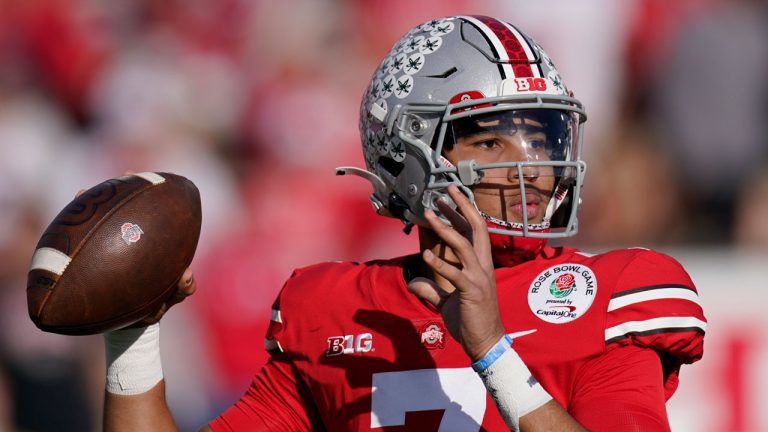 Ohio State quarterback C.J. Stroud throws during the first half in the Rose Bowl NCAA college football game. (Mark J. Terrill/AP)