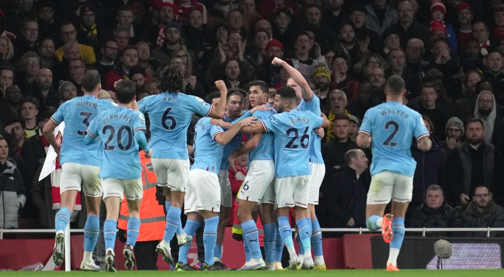 Man City beats Arsenal to grab first place in Premier League