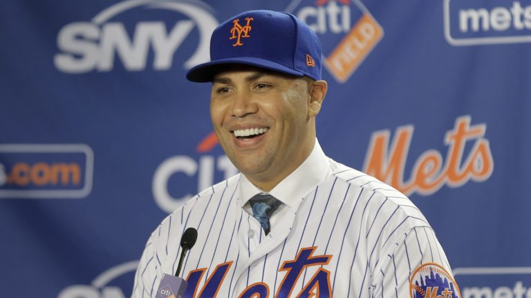 Former New York Mets manager Carlos Beltran smiles during an introductory baseball news conference in New York, Nov. 4, 2019. (Seth Wenig/AP)