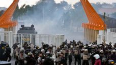 Indonesian police fire tear gas to disperse soccer fans