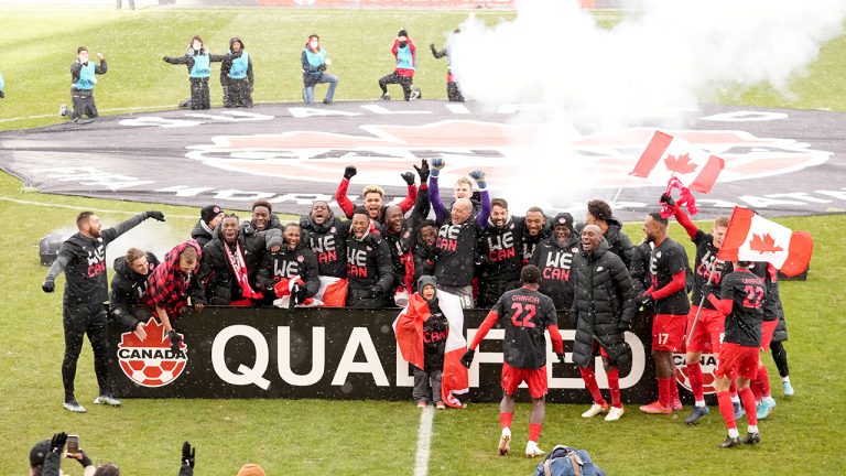 Canada players celebrate their win following second half CONCACAF World Cup soccer qualifying action against Jamaica, in Toronto on Sunday, March 27, 2022. (Nathan Denette/CP)