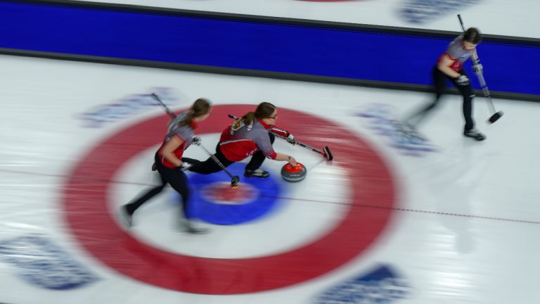 Northwest Territories skip Kerry Galusha delivers a rock while playing Ontario at the Scotties Tournament of Hearts, in Kamloops, B.C., on Sunday, February 19, 2023. (Darryl Dyck/CP)