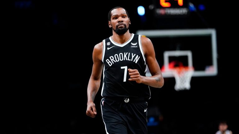 Former Brooklyn Nets star Kevin Durant runs on the court during the first half of an NBA basketball game against the Golden State Warriors Wednesday, Dec. 21, 2022 in New York. (Frank Franklin II/AP Photo)