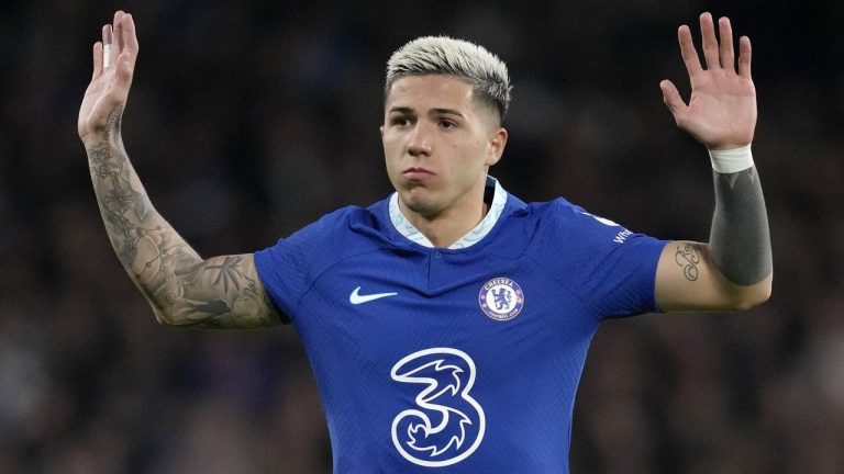 Chelsea's new signing Enzo Fernandez gestures before the English Premier League soccer match between Chelsea and Fulham at Stamford Bridge stadium in London, Friday, Feb. 3, 2023. (Kirsty Wigglesworth/AP)