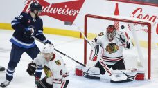 Wheeler navigates Jets to win over Blackhawks with three-point game