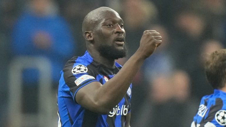 Inter Milan's Romelu Lukaku, left, celebrates after scoring during the Champions League, round of 16, first leg soccer match between Inter Milan and Porto, at the San Siro stadium in Milan, Italy, Wednesday, Feb. 22, 2023. (Luca Bruno/AP)