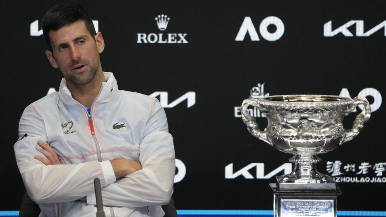 Novak Djokovic of Serbia reacts during a press conference following his win over Stefanos Tsitsipas of Greece in the men's singles final at the Australian Open tennis championship in Melbourne, Australia, early Monday, Jan. 30, 2023. (Dita Alangkara/AP)