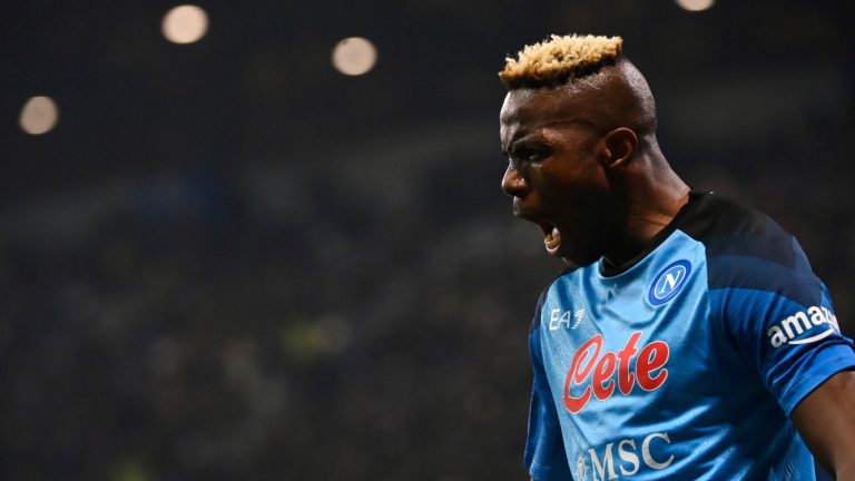 Napoli's Victor Asimhen celebrates after scoring to 0-2 during the Serie A soccer match between Sassuolo and Napoli, at the Mapei Stadium in Reggio Emilia, Italy, Friday Feb. 17, 2023. (Massimo Paolone/LaPresse via AP)