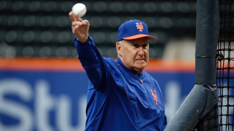 Phil Regan an assistant minor league pitching coordinator, throws batting practice with New York Mets players before a baseball game against the Miami Marlins, Friday, April 7, 2017, in New York. Phil Regan sued the New York Mets and former general manager Brodie Van Wagenen, alleging discrimination and unlawful discrimination since he was moved out as pitching coach after the 2019 season. A complaint was filed Monday, Feb. 20, 2023 in New York Supreme Court. (Frank Franklin II/AP)