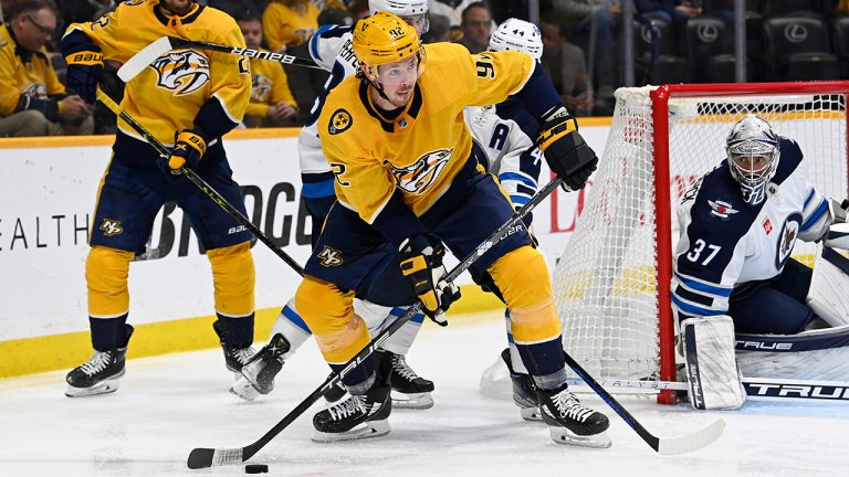 Nashville Predators center Ryan Johansen looks to pass the puck during the second period of the team's NHL hockey game against the Winnipeg Jets on Tuesday, Jan. 24, 2023, in Nashville, Tenn. (Mark Zaleski/AP)