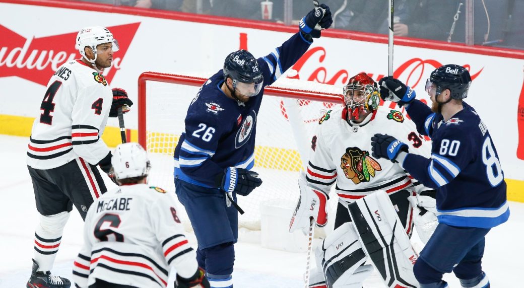 Wheeler navigates Jets to win over Blackhawks with three-point night Wheeler navigates Jets to win over Blackhawks with three-point night