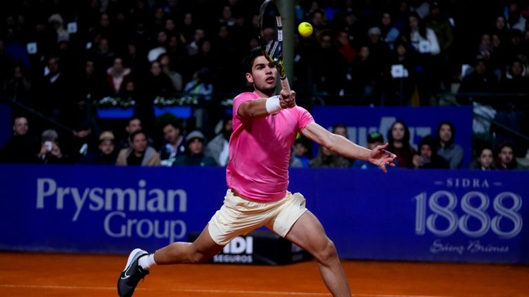 Carlos Alcaraz of Spain returns the ball to Dusan Lajovic of Serbia during an Argentina Open ATP quarterfinals match, in Buenos Aires, Argentina, Friday, Feb. 17, 2023. (Natacha Pisarenko/AP)